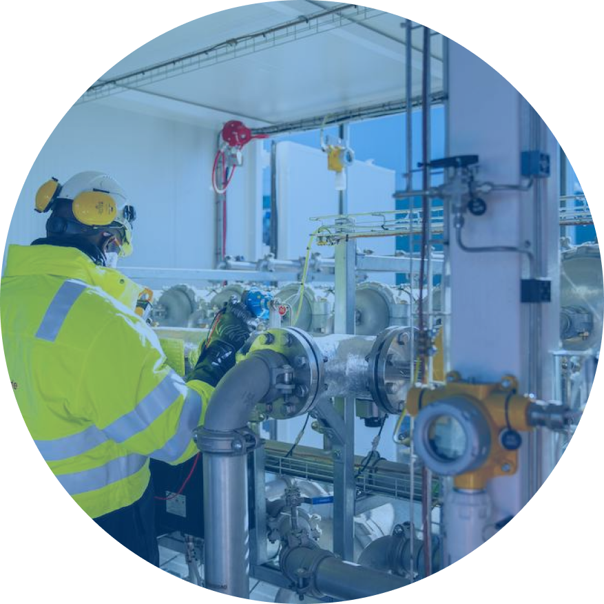 Person cutting metal with machinery