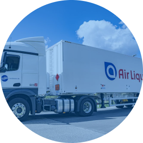 Staircase and pipelines attached to an industrial building